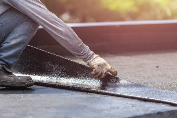 Professional Basement Waterproofing technician working in Washington, KS